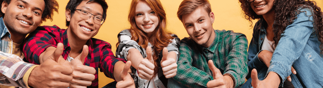 Diverse group of happy individuals showcasing their approval for the best wellness products collection