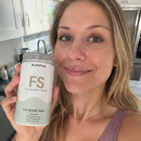 A 3x3 collage of people holding and drinking from a can of Sanox FS Protein Powder in various real-world settings, including beach, mountain, office, and home environments.